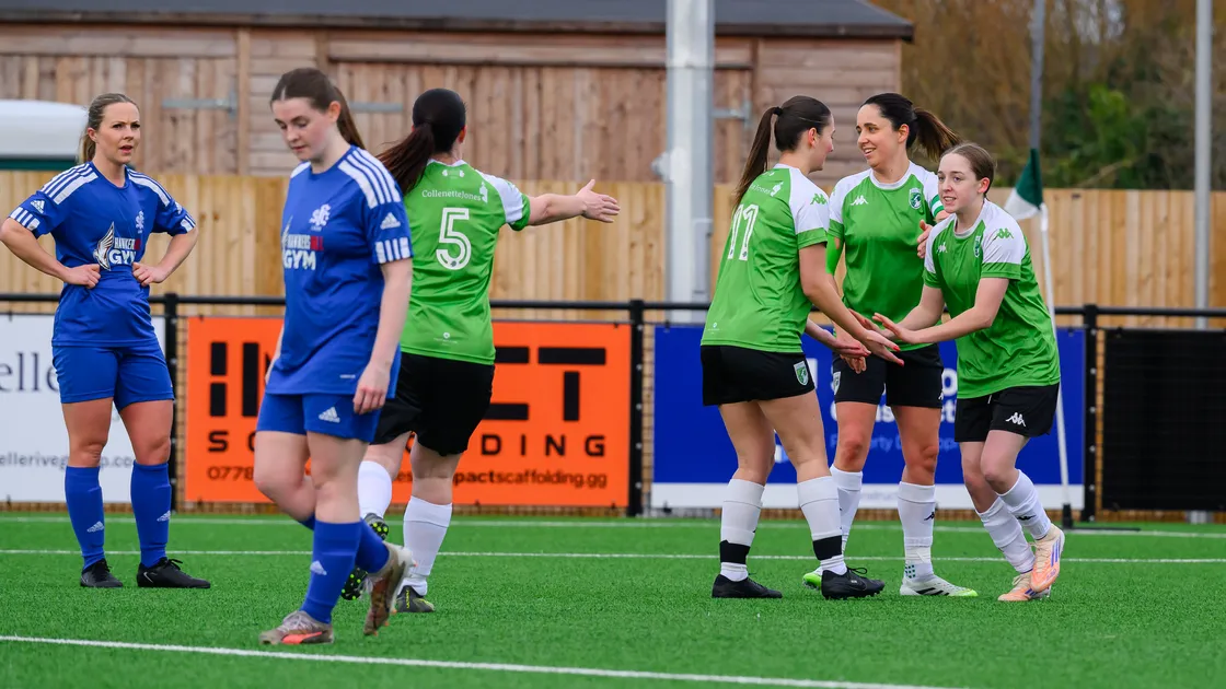 Ruby Smith, far right, is congratulated on her goal