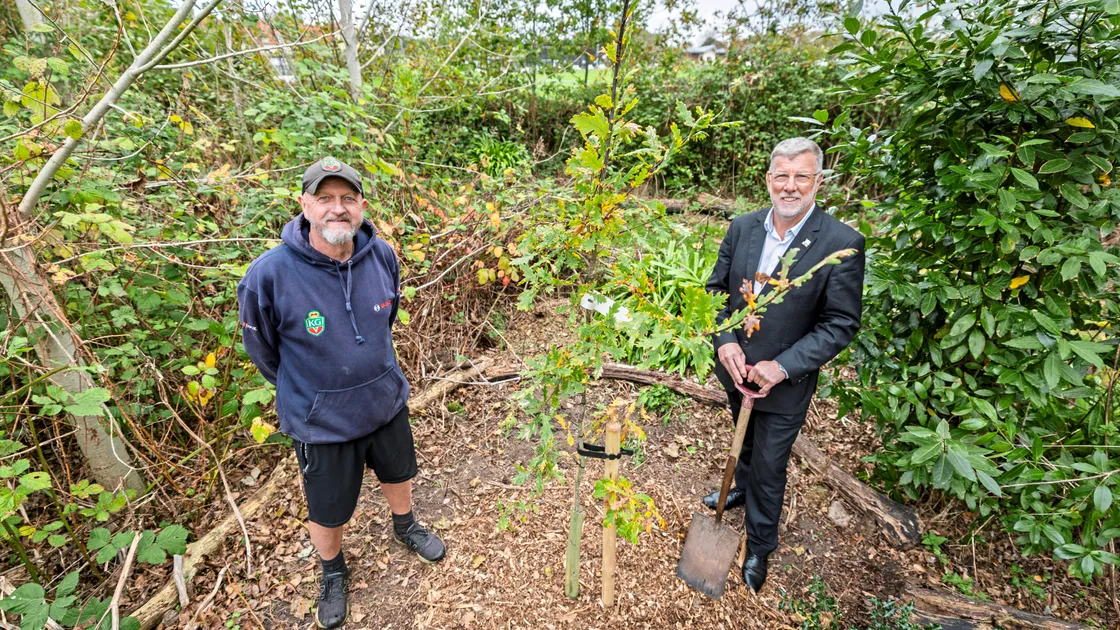Deputy Adrian Gabriel (right) planted the tree with Pete De Mouilpied from the grounds staff at KGV