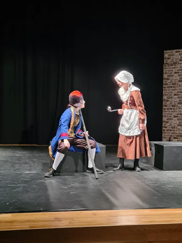 Red Lawson, left, and Izabella Lucane as Mr Bumble and Widow Corney