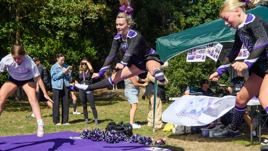 The Sarnia Legacy cheerleading group encouraged visitors to try some routines at Saturday's Sports Funday at Saumarez Park. 	 (Pictures by Andrew Le Poidevin, 34915994)