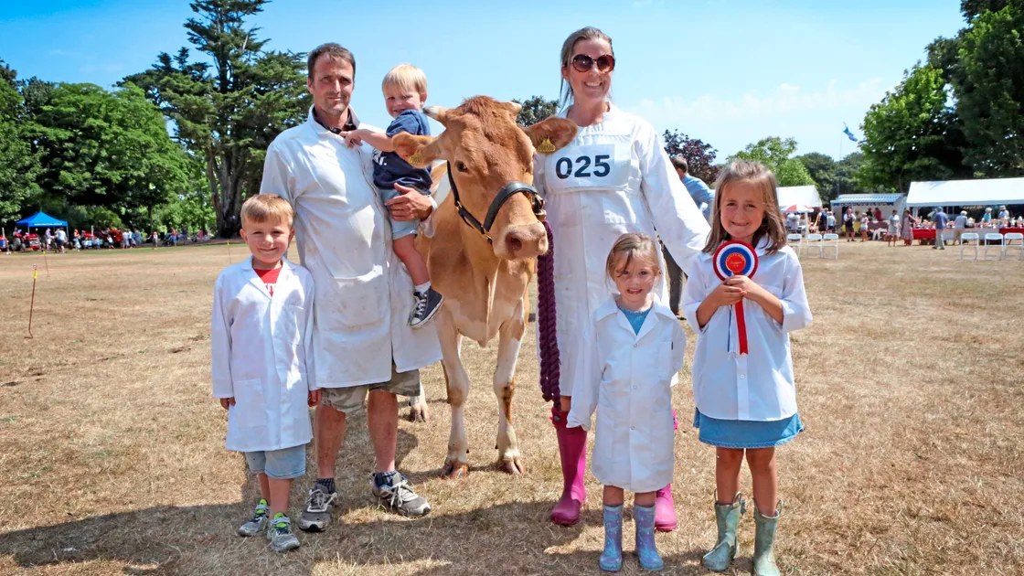 Left to right; Harry, 5, Ben Wallace, Freddie, 2, Hannah Taylor, Ellie, 4, and Penny with best animal in show, Glenlea Eleanora 2.                            (Picture by Steve Sarre, 22120613)
