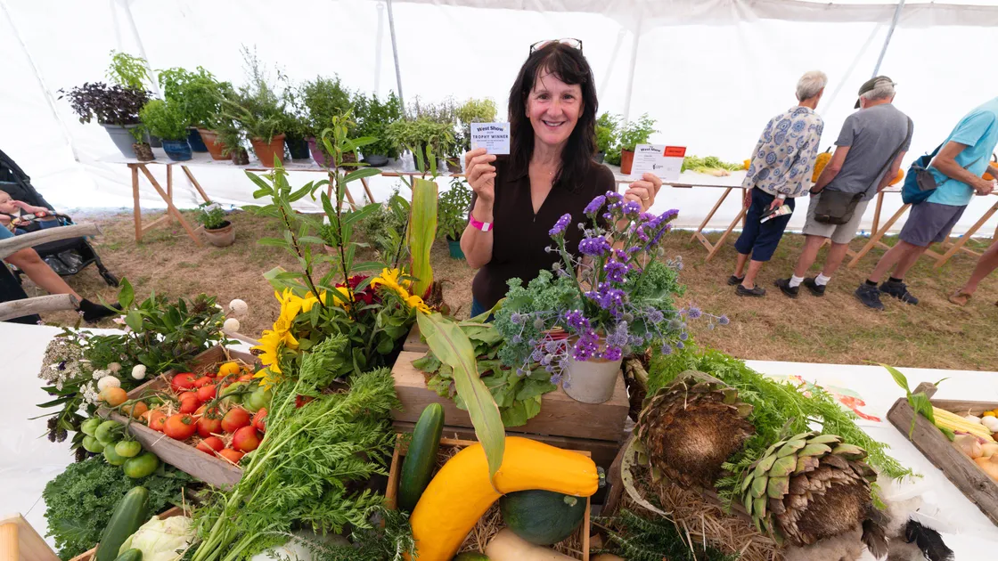 Isabelle Edward of Les Adams Farm with her winning display of veg at L’Eree yesterday.