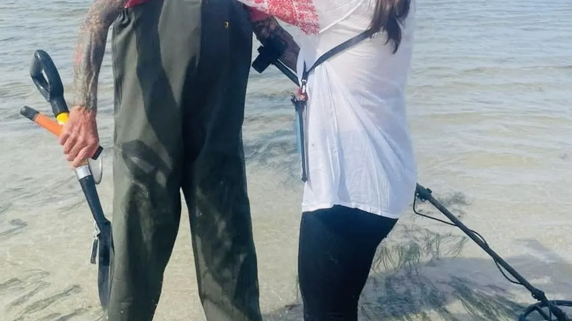 The joyous moment when metal detectorist Matt Kneebone found the rings that Tessa Le Gallez has lost while swimming at Les Amarreurs. (Picture supplied by Tessa Le Gallez)