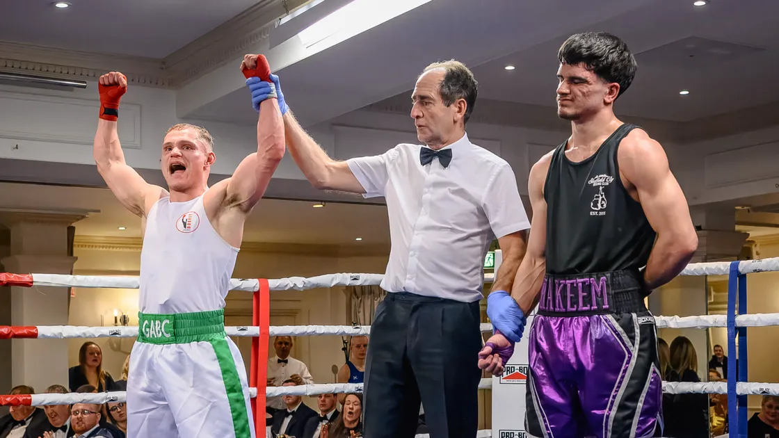 The returning Niall Adams has his hand raised in victory by referee George Jennings after his bout with Hakeem Niwaz on Friday night at St Pierre Park
