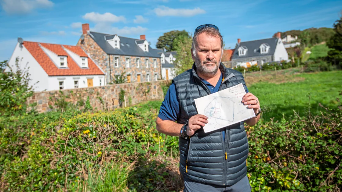 Bomb disposal expert Ben Remfrey shows the suspected location of three unexploded Second World War bombs off Route Isabelle, opposite Le Foulon Cemetery. (Picture by Sophie Rabey, 33658948)