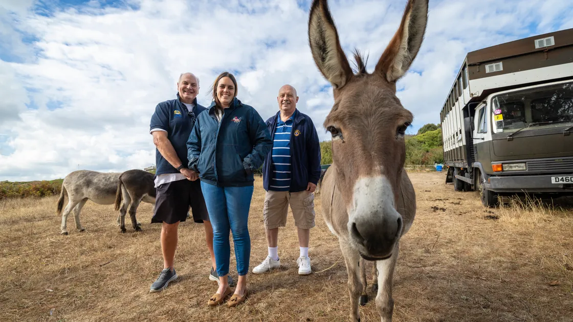 From left: Rob Holder of the Lions Club of Guernsey, Alexandra Fisher of Dashing Donkeys and John Mill, Lions Club member from Hampshire.