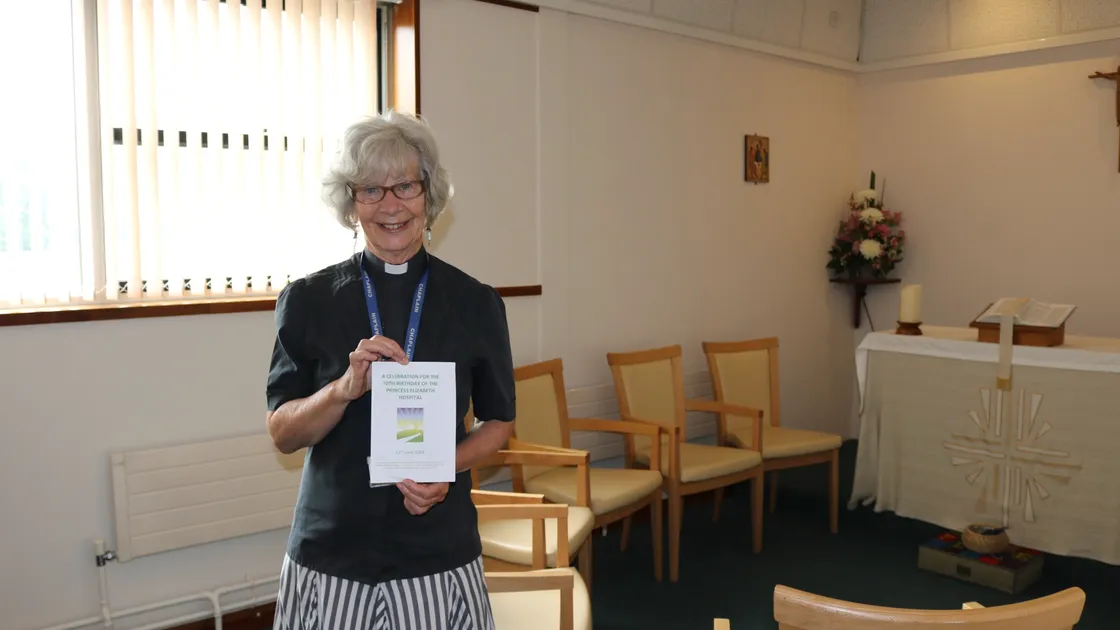 Lead hospital chaplain the Rev. Linda Le Vasseur in the new-look chapel at the Princess Elizabeth Hospital with the service programme for its 70th anniversary, which contained elements of a number of faiths, including Christianity, Judaism, Islam, Hinduism and Buddhism. (Picture by Charlotte Le Marquand, 25126298)