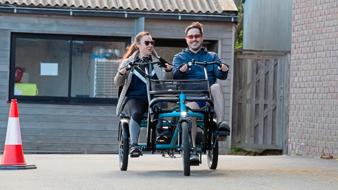 Tom Oswin and partner Rebecca riding a side-by-side trike at yesterday’s Wheels for You open day. (Pictures by Connor Rabey, 33162216)