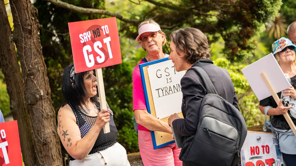 Deputy Lindsay de Sausmarez meeting protesters outside the Royal Court as States members arrived for the first day of debate on P&R’s tax proposals last month.