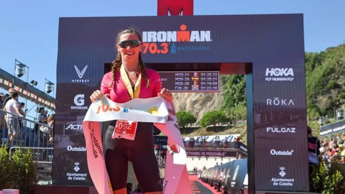 Megan Chapple takes the tape to win the Ironman 70.3 Barcelona. (31327462)
