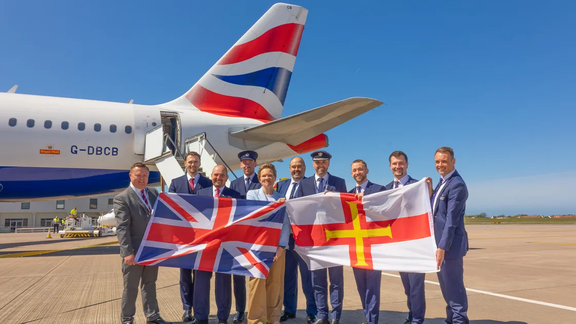 British Airway crew with ties to Guernsey were invited to operate the first flight back to the island, including Captain Stef Loveridge, fourth from right. They were met by local representatives.