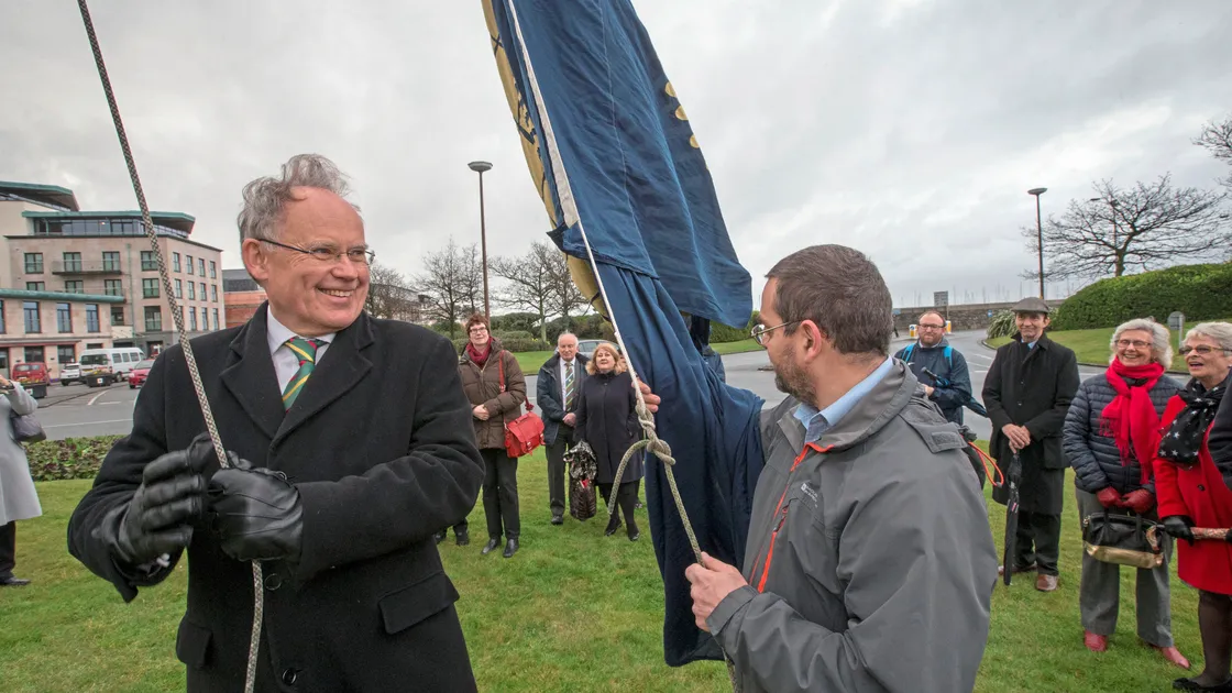 Bailiff Sir Richard Collas took the place of the Lt-Governor, Vice-Admiral Sir Ian Corder, for the traditional flag-raising ceremony to mark Commonwealth Day. Alongside him is Tony Browning.                                                                                                  (Picture by Steve Sarre, 20903364)