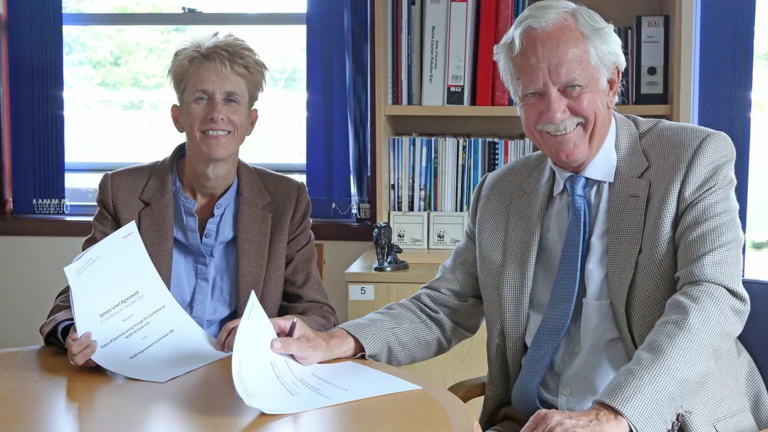 Health & Social Care president Deputy Heidi Soulsby and Health Improvement Commission chairman Stuart Falla at the signing of the service level agreement. (Picture by Steve Sarre, 22474655)