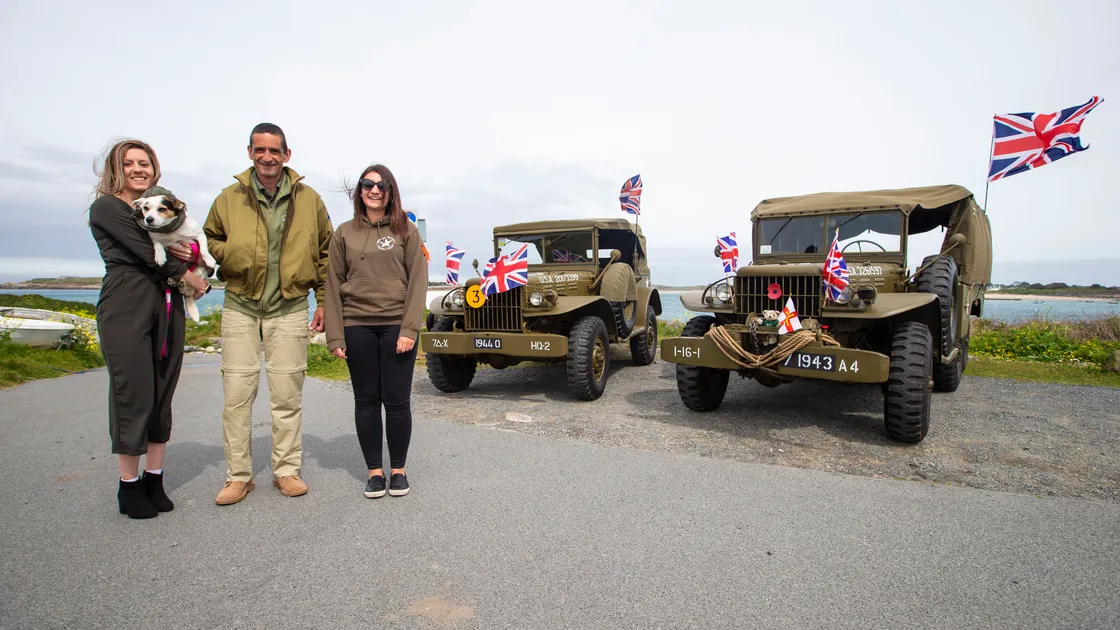 Picture by Sophie Rabey.  04-05-20.  Guernsey Military Vehicle Group have had to change their plans that they had in place for the 75th Liberation Day here this year because of Coronavirus Lockdown.  Instead of the usual cavalcade they will be posting videos on their social media throughout the day to show islanders some of their members military vehicles.  Dyer family, L-R Sophie, Stuart and Laura.. (28240603)