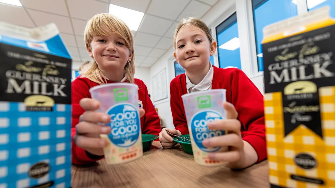 Vale pupils Winston Beharrell, left, and Naomi Stonebridge, both 8. Guernsey Dairy is supplying Milk for Vale School’s Breakfast Club in collaboration with Island Health