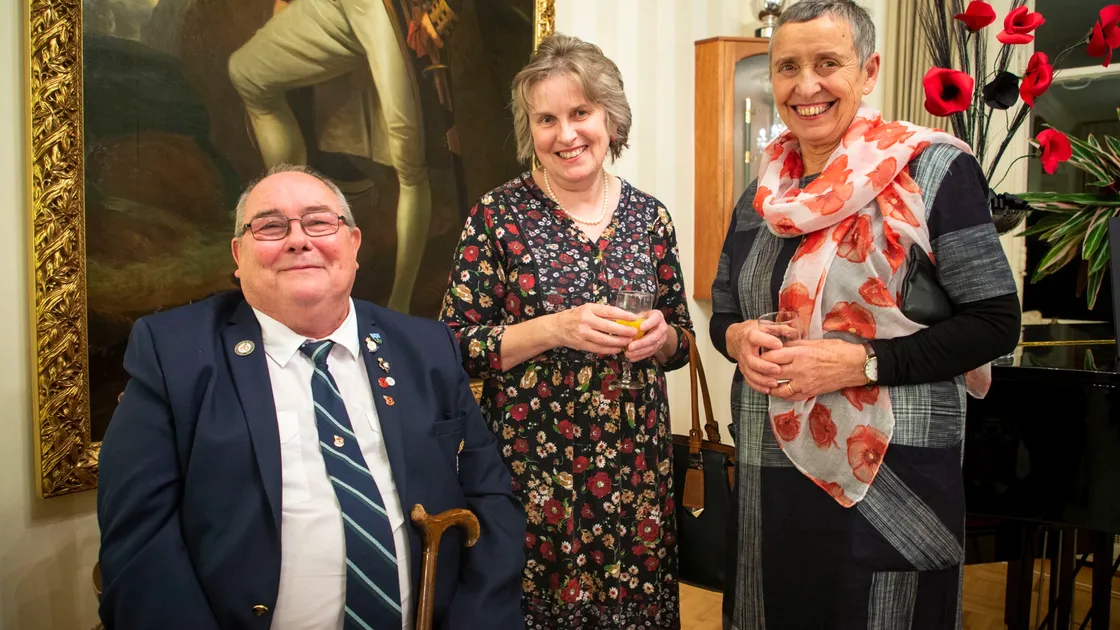 The reception held at Government House to thank volunteers for this year’s Poppy Appeal. Left to right are Peter Line, Frances Ogier and Marlene Place. (Picture by Sophie Rabey, 26285489)
