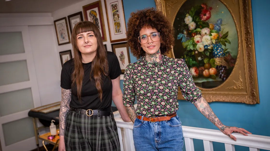 Zineb Slaimi, left, the owner of Sacrebleu Tattoo Studio, is surprised at how many people in Guernsey want tattoos. They are keeping her and colleague Kaya Ozard busy. (Picture by Sophie Rabey, 31862306)