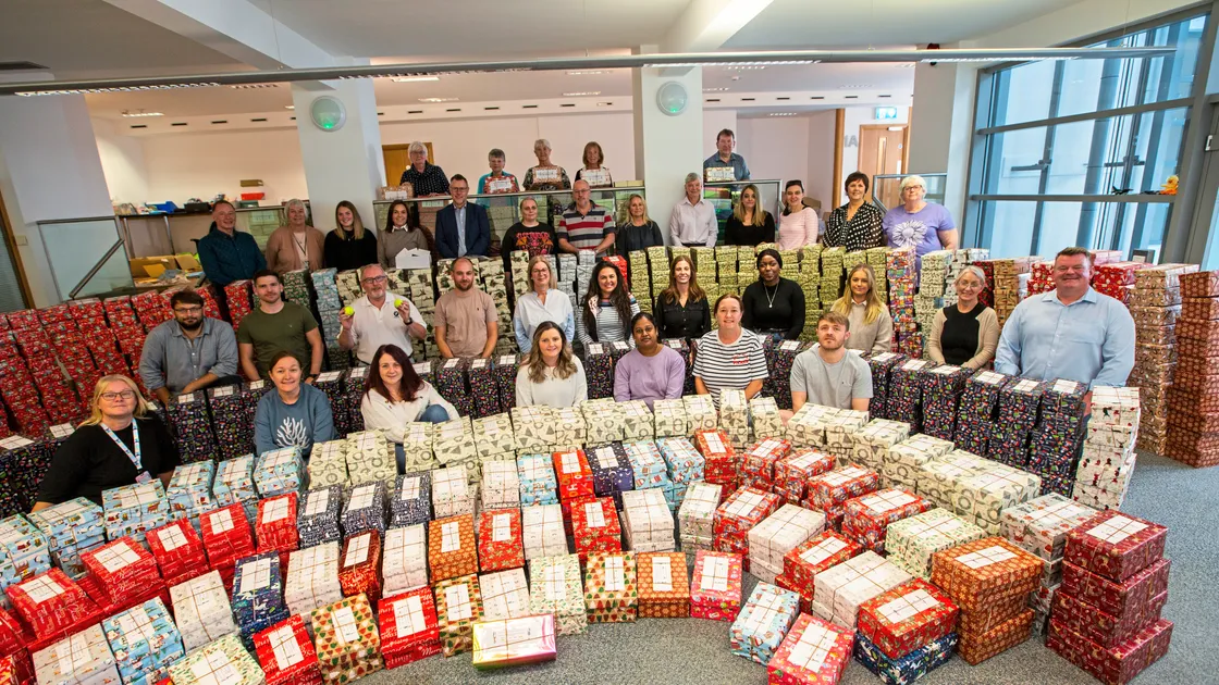 Artex staff and Rodley Park residents with the shoeboxes they have helped to pack for the appeal. (Picture by Sophie Rabey, 33699918)