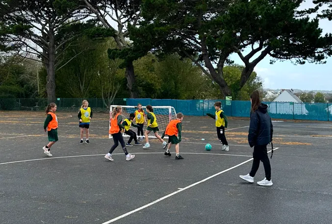 Scarlett Kenneally, women & girls football development officer at the Guernsey FA, coaching some local youngsters