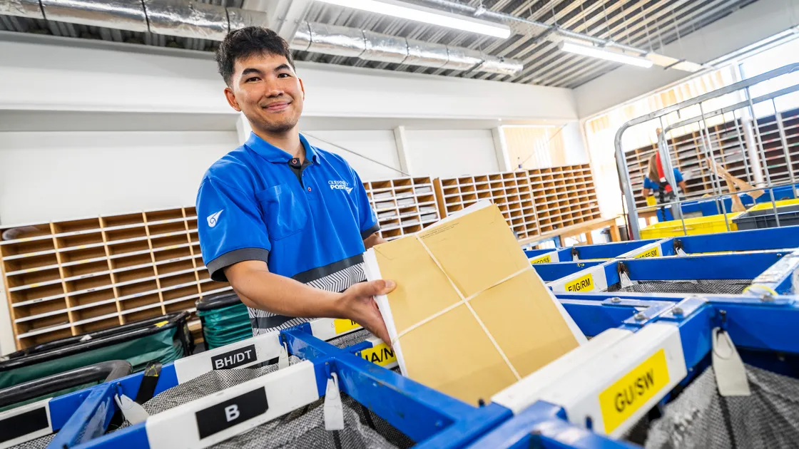 Guernsey Post worker Tuey Khongyim sorting mail into bags for transfer as it prepares for the last mail plane to leave the island tonight. The post will now only be transferred via boat.