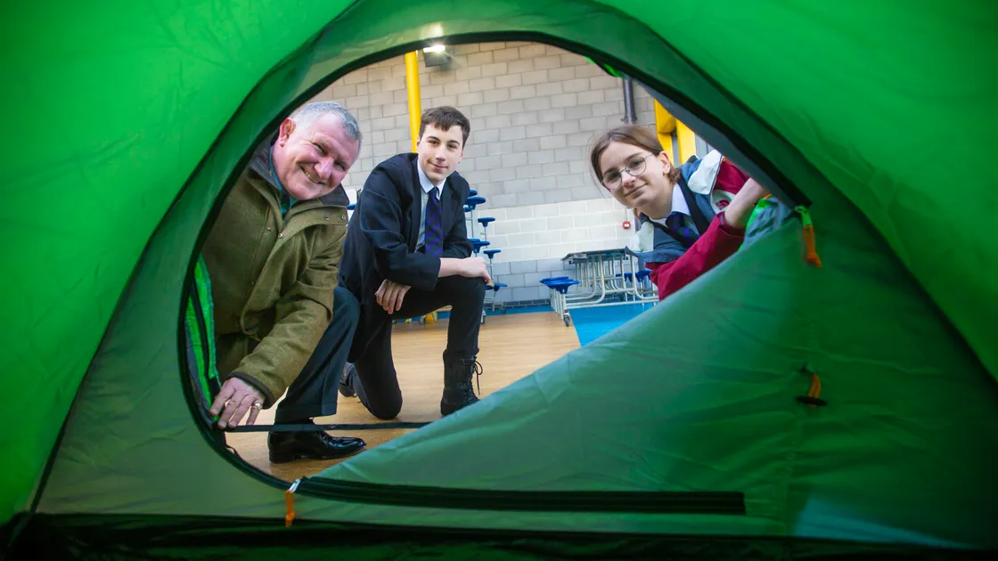 The task of putting up a tent in front of the Lt-Governor in yesterday’s gusty wind fell to silver Duke of Edinburgh’s award students Mason Torode, 15, and Lilly Torode, 14.  (Pictures by Peter Frankland, 31899672)