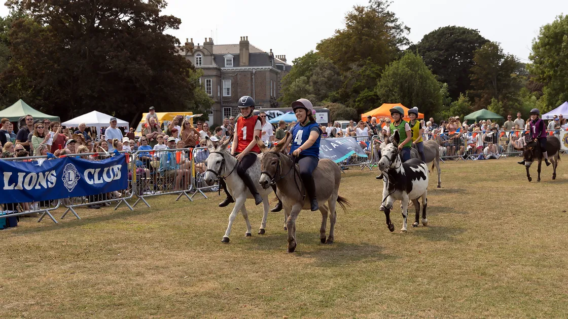 Now in its 55th year, the fundraising event will once again treat islanders to a day full of donkey racing.