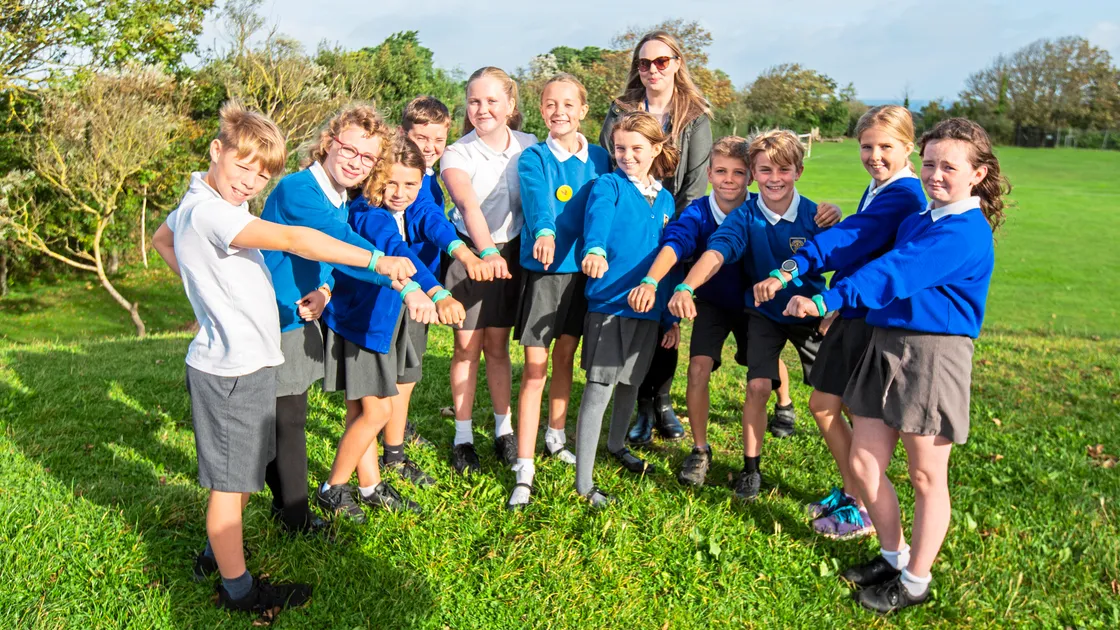 La Houguette Primary School took part in a survey to find out more about the activity levels of local pupils. Year 5 children, now in Year 6, wore a physical activity monitor wristband at school for a couple of days and the data was measured before compared to pupils of 13 schools in the UK. The pupils are pictured with their teacher Adele Prince. (Picture by Sophie Rabey, 33667270)