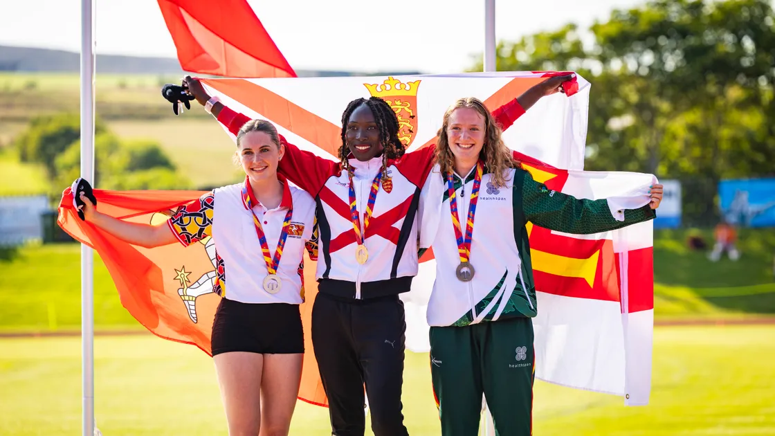 Vicky Hancock on the podium on day one of the Orkney 2025 athletics.