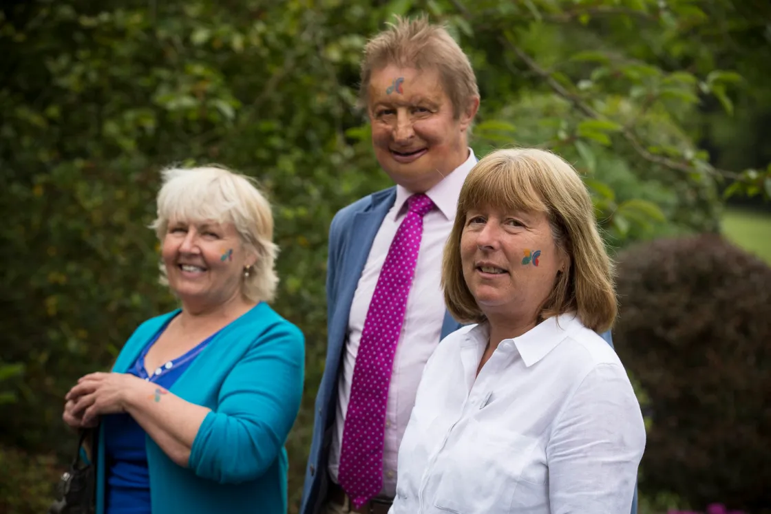 Dr James Partridge, centre, in 2018 with Changing Faces committee member Sue Taylor, left, and Lady Corder, right. Lady Corder is wearing a butterfly on her cheek today in support of Changing Faces charity and facial disfigurement. (Picture by Peter Frankland, 28592954)