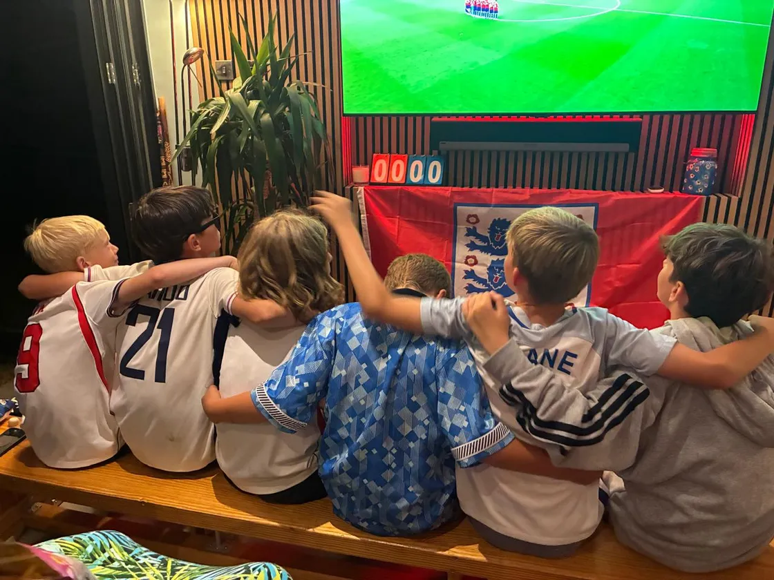 Warming the bench – some of the younger viewers take their allotted seats at the Stade de L’Esperance.