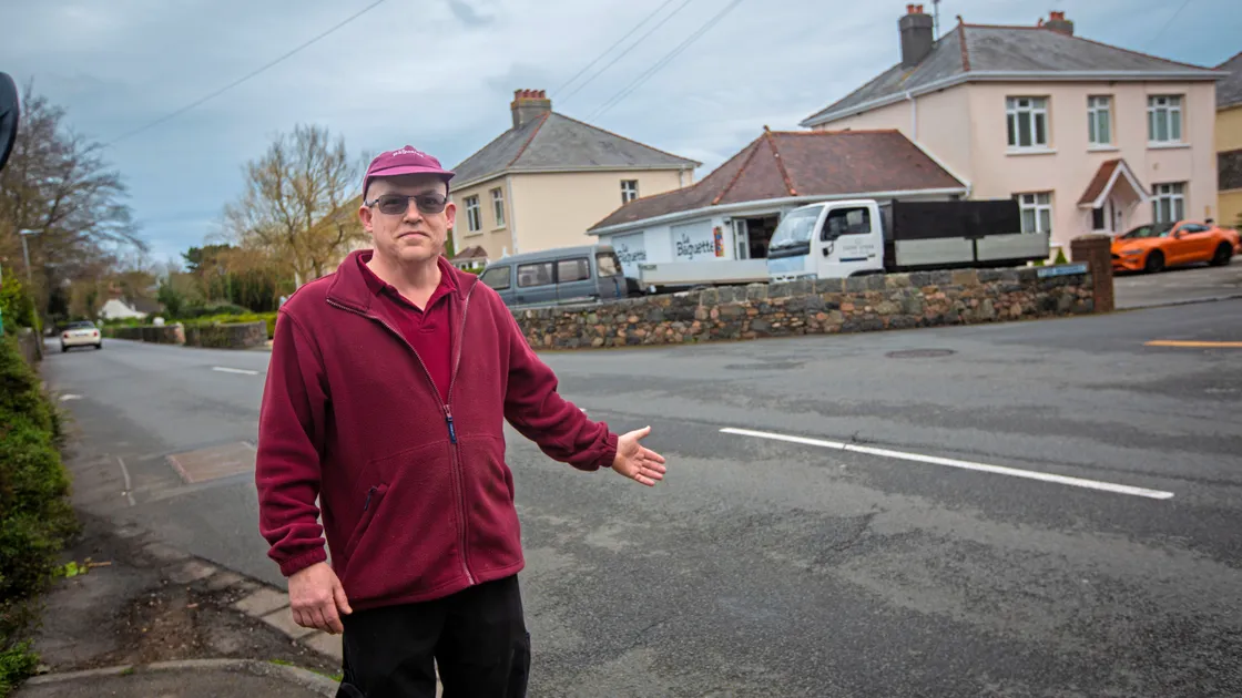 Kenny Tweddell, assistant manager of La Baguette, thinks a filter-in-turn would be a better option than traffic lights at the junction between Les Baissieres and Rue du Friquet. Lights are proposed as part of the traffic scheme for the development of Les Ozouets education site. (Picture by Peter Frankland, 30590917)