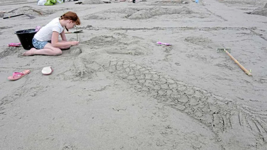 Sculptors shine even without  the sun at Art on the Beach