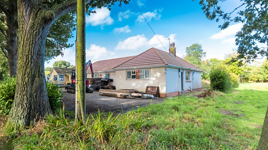 The bungalow backs on to The Orchard – a new housing development for seven houses and four flats behind L’Aumone House