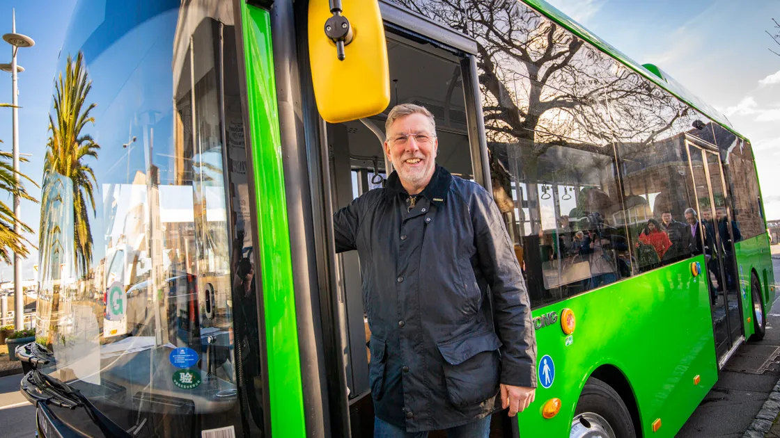 Environment & Infrastructure member Deputy Adrian Gabriel with the Yutong E9 zero-emission electric bus being trialled in the island. (Picture by Sophie Rabey, 31703760)