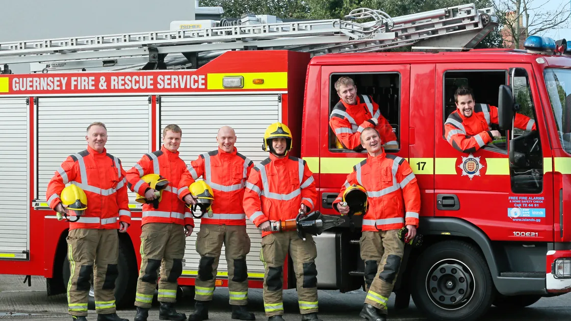 Firefighters attending road traffic collisions and other incidents near traffic will be seen more easily thanks to new bright orange jackets they will wear instead of the gold ones which they will still use for firefighting. Left to right are: Gavin Robins, Alex Clark, Liam Davey, Kyle Fossey, James Bougourd, Grant Hutchins and James Sheppard. (Picture by Adrian Miller, 20527639)