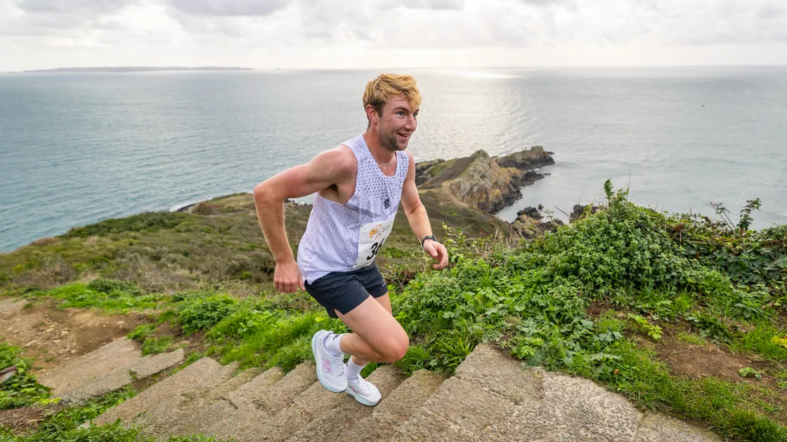 Thierry Le Cheminant nears the top of Jerbourg Steps in the lead.