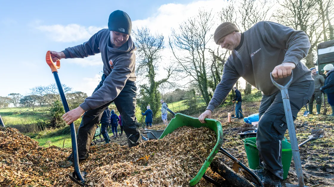 Sammy Bott, left, and Paul Le Poidevin planting trees at Les Piques
