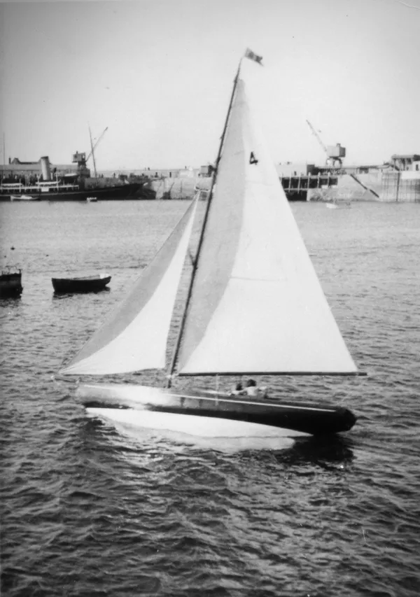 Mr Sherwill’s mother, Pat, eight years old at the time, sailing Cockleshell in St Peter Port with her father, AJ Barber, who built it.  