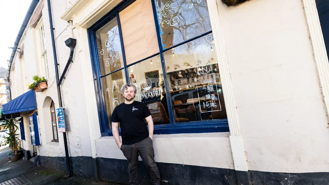 Ben Hall of sake wine bar Tokkuri in Trinity Square has thanked peeople who have offered words of support after one of the window panes was smashed with a small orange traffic light. 						 (Picture by Sophie Rabey, 34637935)