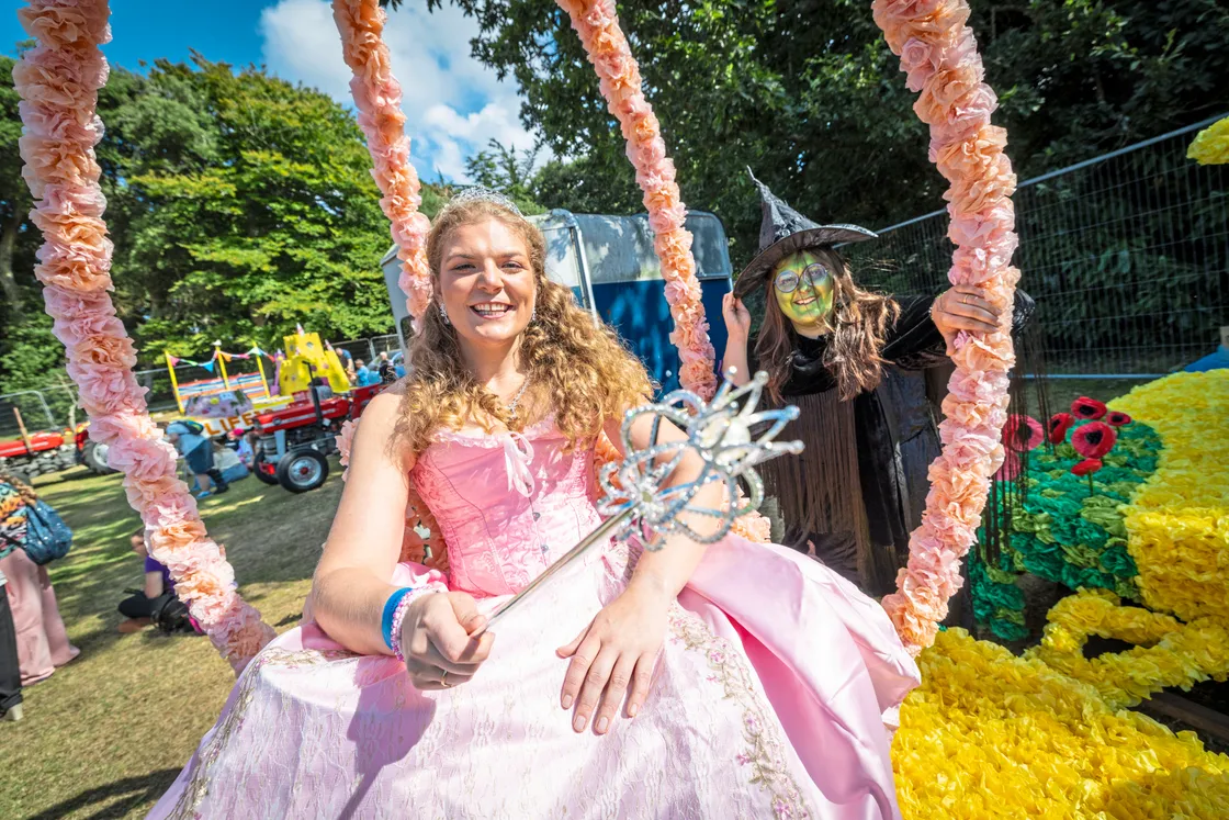 Beth Gabriel, left, and Meredith Jee on their float – Wicked