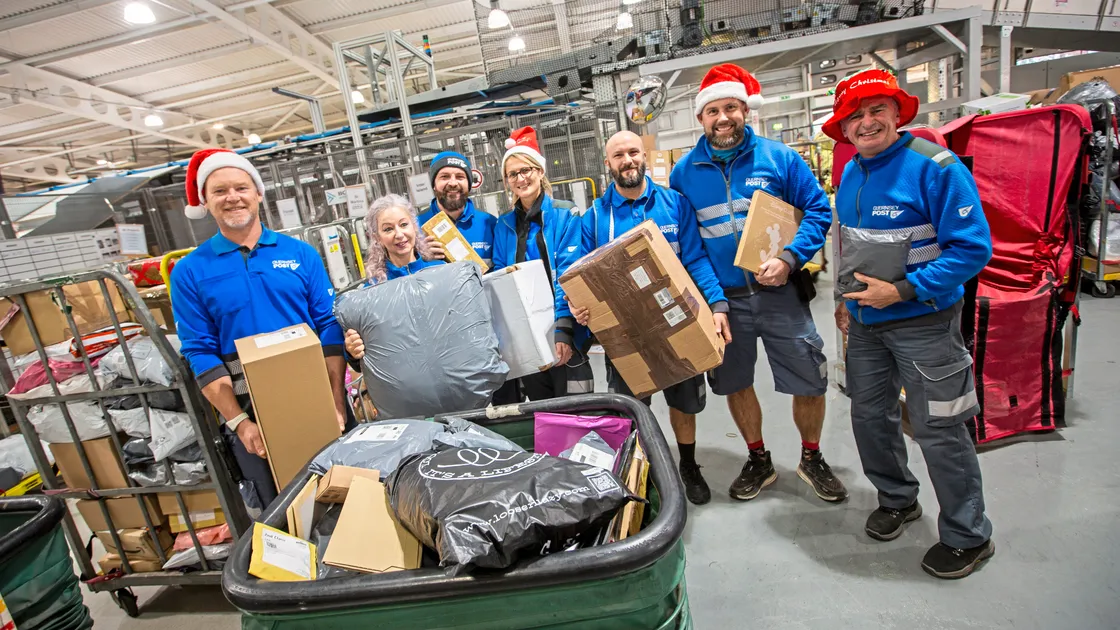 Guernsey Post has delivered over one million items during the festive peak period. Pictured are postal workers, left to right, Dean Bradley, Olga Abreu, Dan Ormrod, Candice Crowson, Chris King, Pete Le Prevost and Paul Wakeham. (Picture by Sophie Rabey, 33889898)