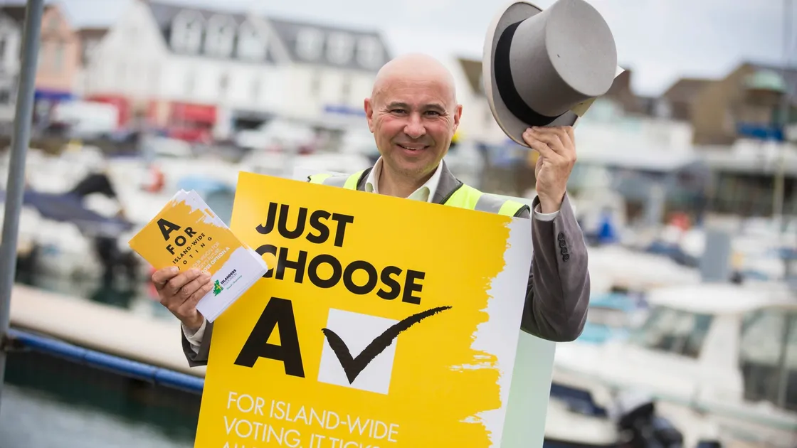 Deputy Carl Meerveld was at the Bridge yesterday promoting the Islanders Association’s preferred option ahead of the referendum. (Picture by Peter Frankland, 22515793)