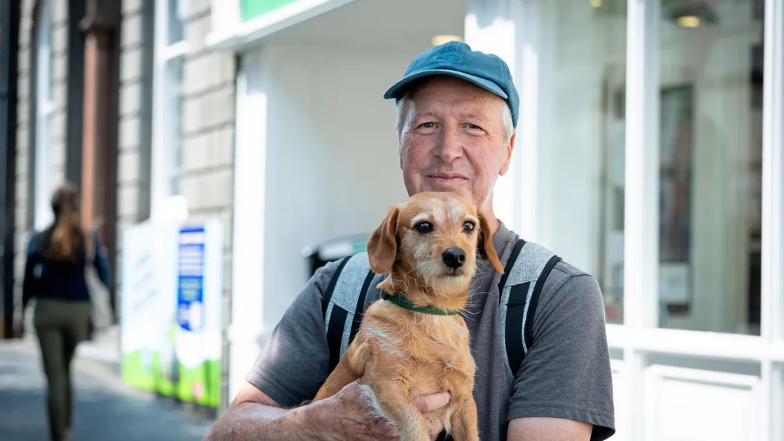 Chris Betley and Eric the dog.