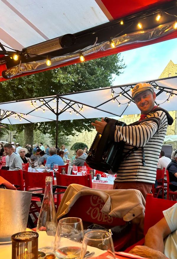 The ever-present accordion player at Cafe de l’Ouest in St Malo. 