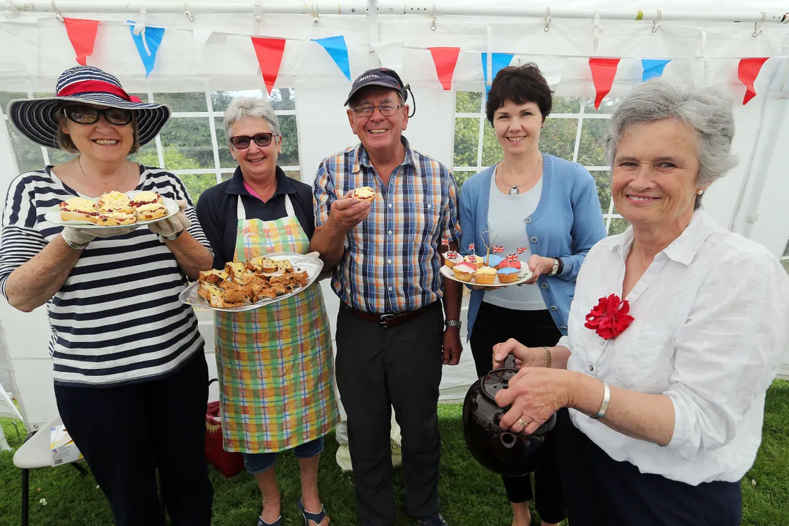 It was not all work and no play for Martin Ozanne, here enjoying afternoon tea as St Peter’s marked Queen Elizabeth II’s 90th birthday with, left to right, Judy Nettleton, Teresa Holden, Sally Wilkinson and Helen Colmer.  (31624268)