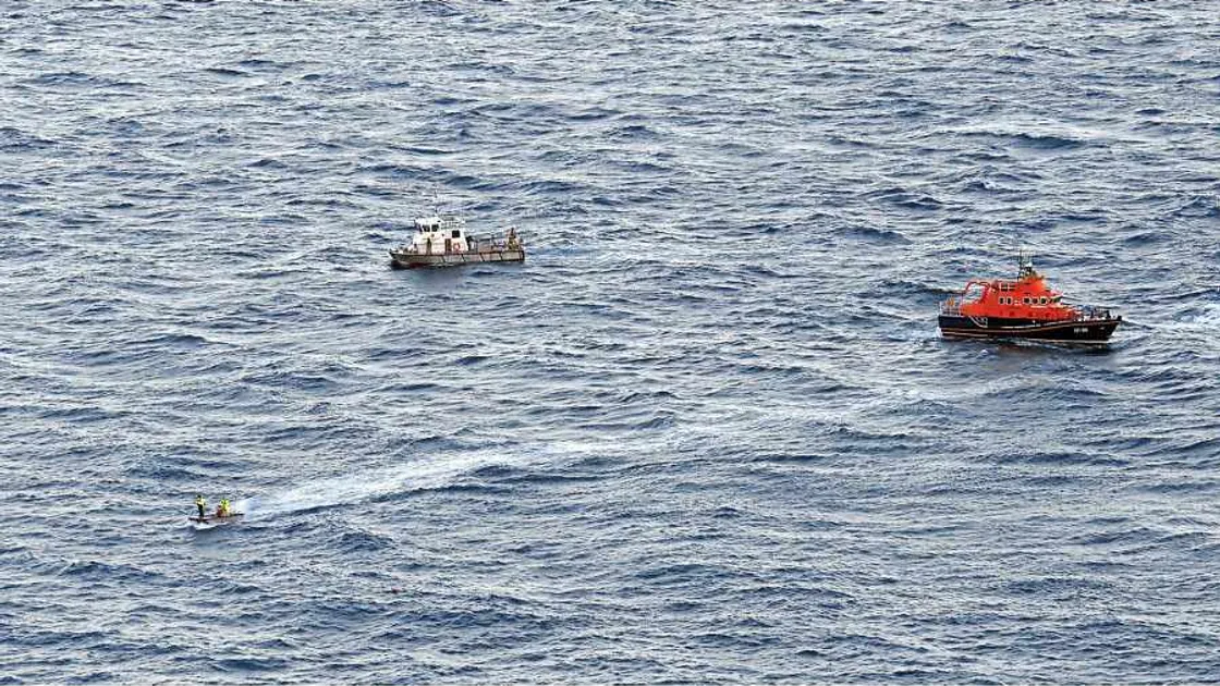 Two men rescued after boat sinks