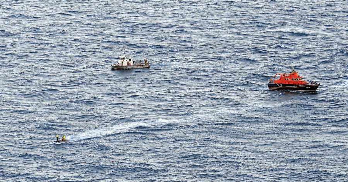 Two men rescued after boat sinks