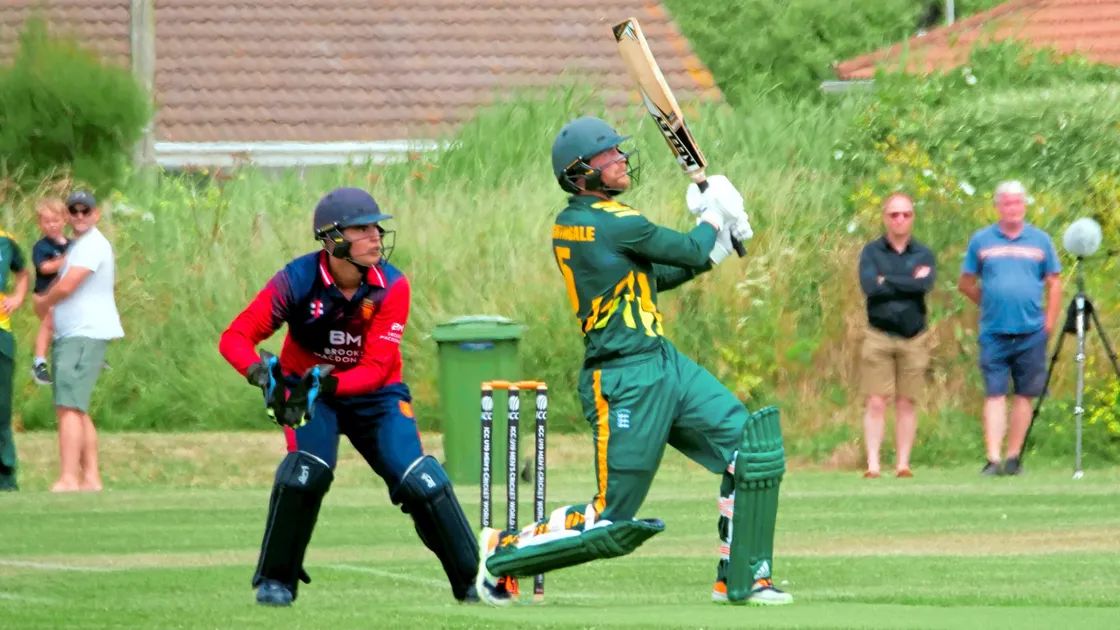 Tom Nightingale watches the ball clear the boundary as he hits one of three successive sixes. (Picture by Gareth Le Prevost, 33356434)