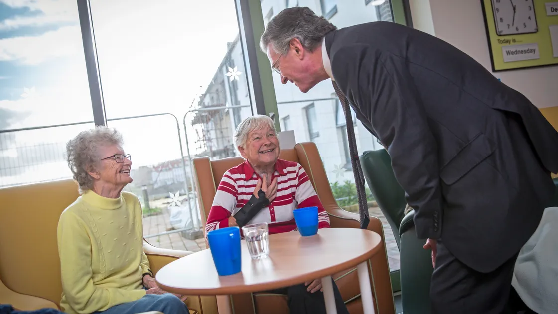 Bailiff Sir Richard McMahon talks to Shelia Baker, left, and Joan Gill. (Picture by Peter Franklan, 32822152)