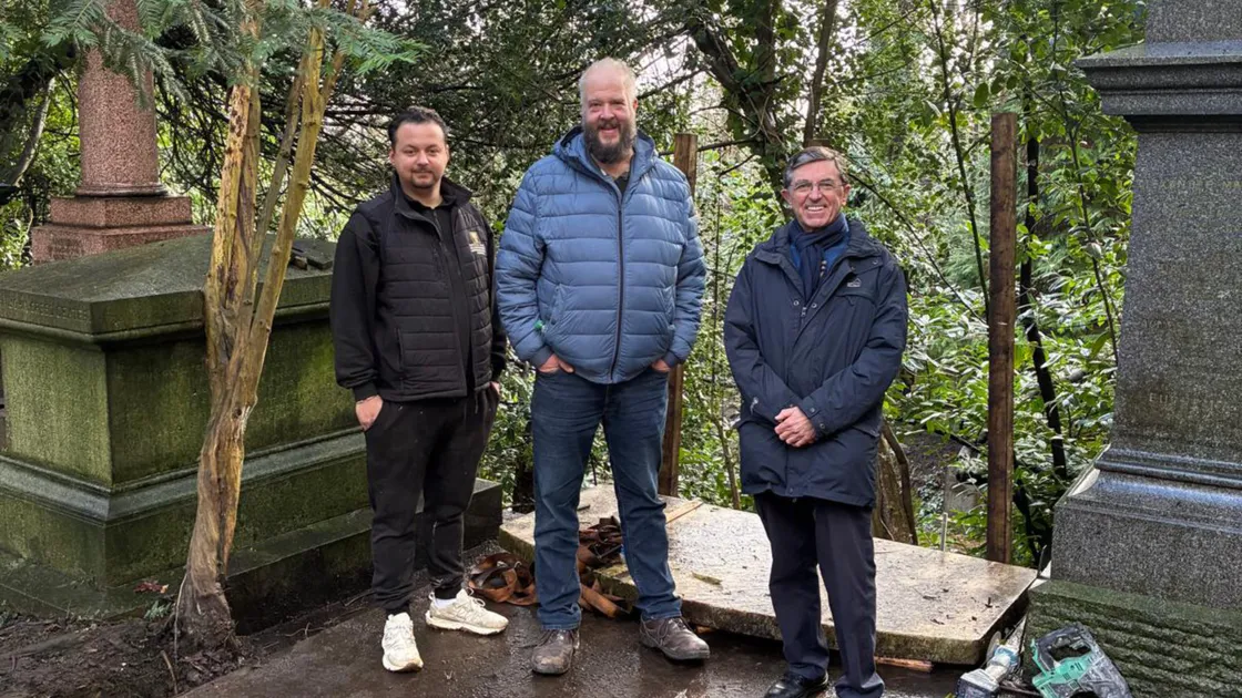 London Stone Conservation assistant Jordan Royce-Halland, left, and director Florian Kirchertz with Guernsey Society chairman Keith Le Page, right, at Highgate Cemetery, where Captain William Le Lacheur’s headstone is situated. The company recovered the stone and has carried out essential stabilisation and corner repairs